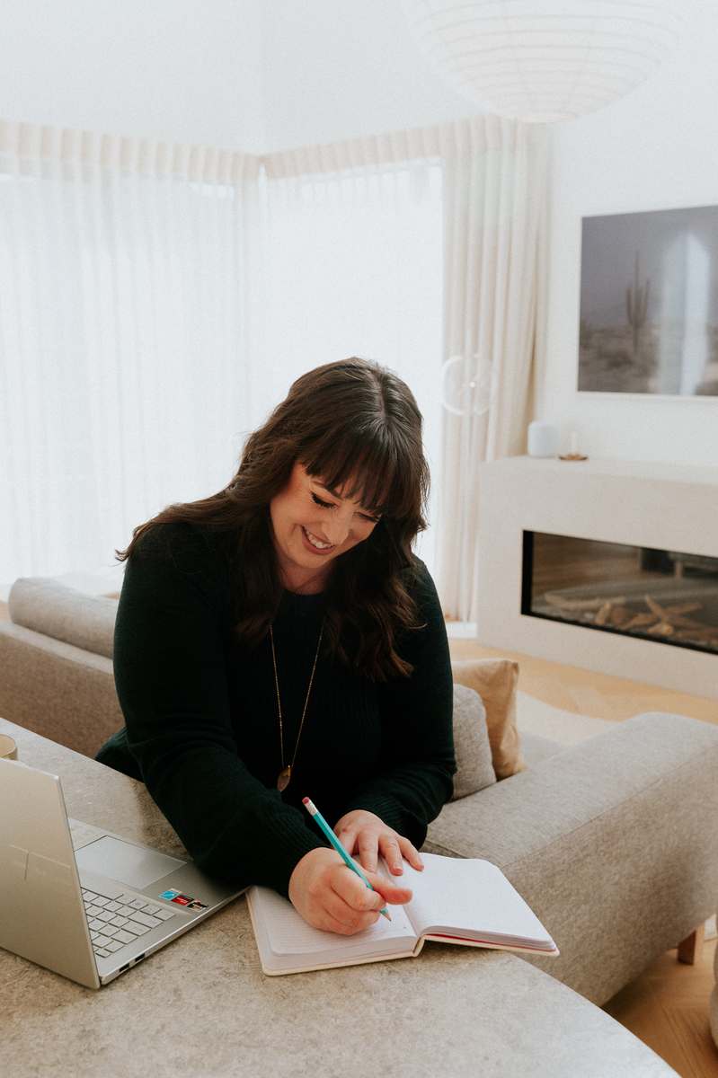 Nicole with laptop, relaxed